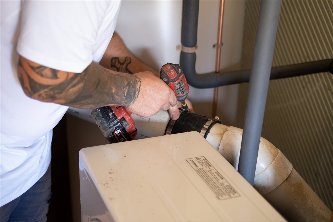 Geelong Heat&nbsp;Pumps installer plumbing in a heat&nbsp;pump