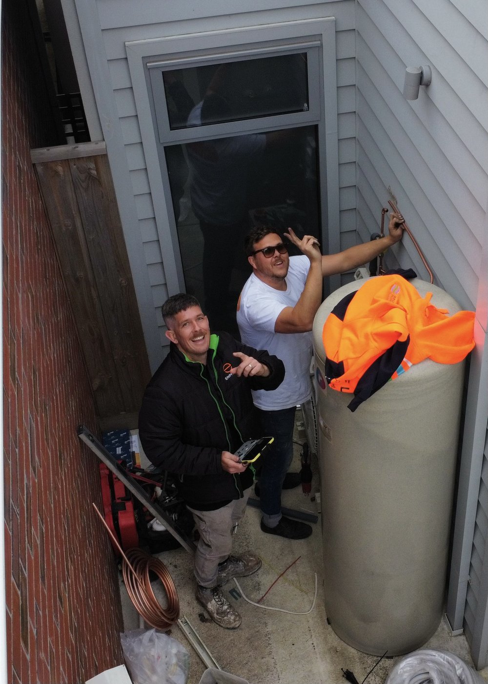 Cam and Josh on a Reclaim Energy install